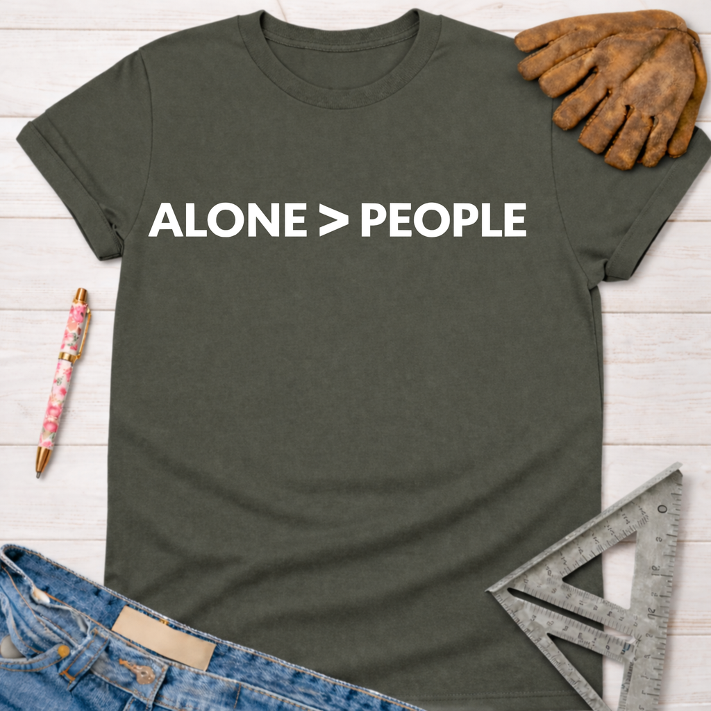 Women's funny woodworking graphic tee shirt for female woodworkers, makers, and DIY builders — Sawdust & Ponytails. Dark gray cotton t-shirt with "ALONE > PEOPLE" in white text.