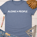 Women's funny woodworking graphic tee shirt for female woodworkers, makers, and DIY builders — Sawdust & Ponytails. Blue cotton t-shirt with "ALONE > PEOPLE" text.