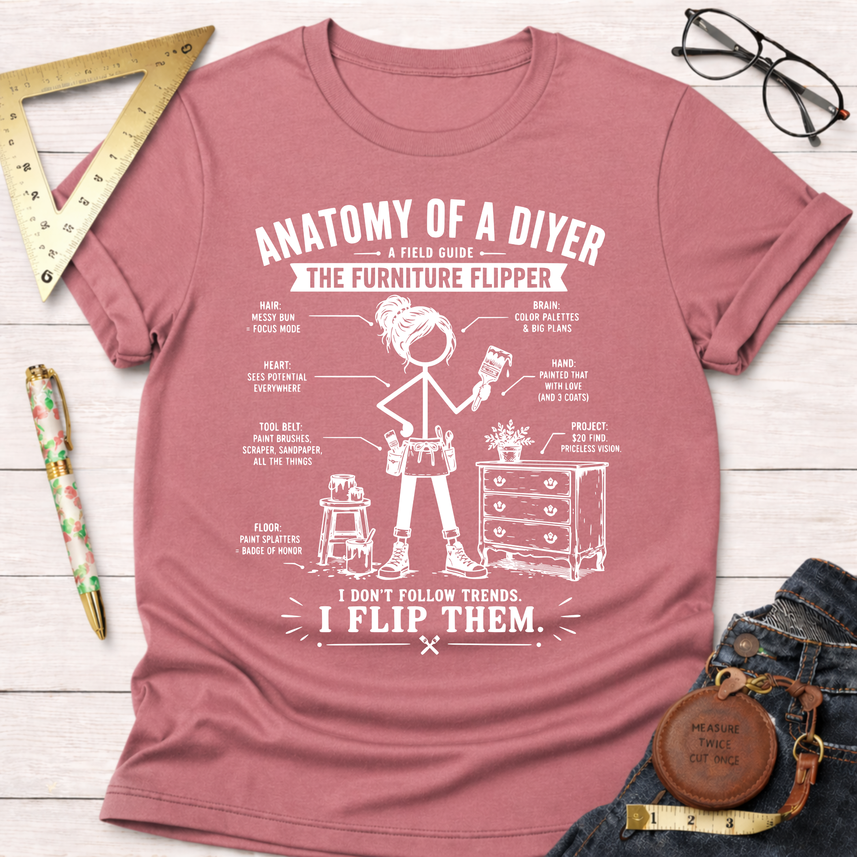 Women's funny woodworking graphic tee shirt for female woodworkers, makers, and DIY builders — Sawdust & Ponytails. Mauve pink cotton tee with "Anatomy of a DIYer The Furniture Flipper" graphic.