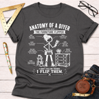 Women's funny woodworking graphic tee shirt for female woodworkers, makers, and DIY builders — Sawdust & Ponytails. Dark gray cotton tee with "Anatomy of a DIYer The Furniture Flipper" graphic.