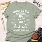 Women's funny woodworking graphic tee shirt for female woodworkers, makers, and DIY builders — Sawdust & Ponytails. Light green cotton t-shirt with "Anatomy of a DIYer The Measurer" graphic.