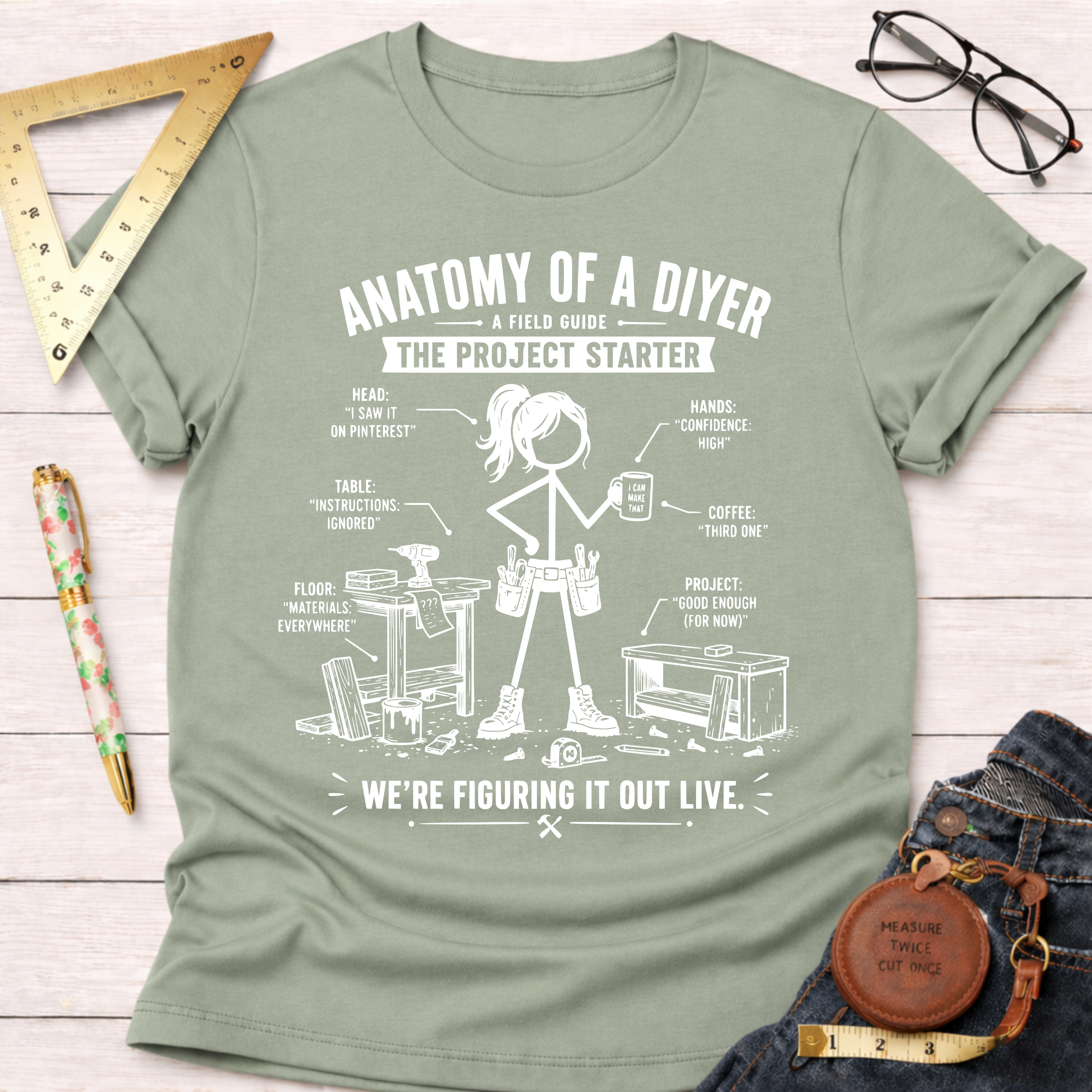 Women's funny woodworking graphic tee shirt for female woodworkers, makers, and DIY builders — Sawdust & Ponytails. Light green cotton t-shirt with a white "Anatomy of a DIYer" graphic.