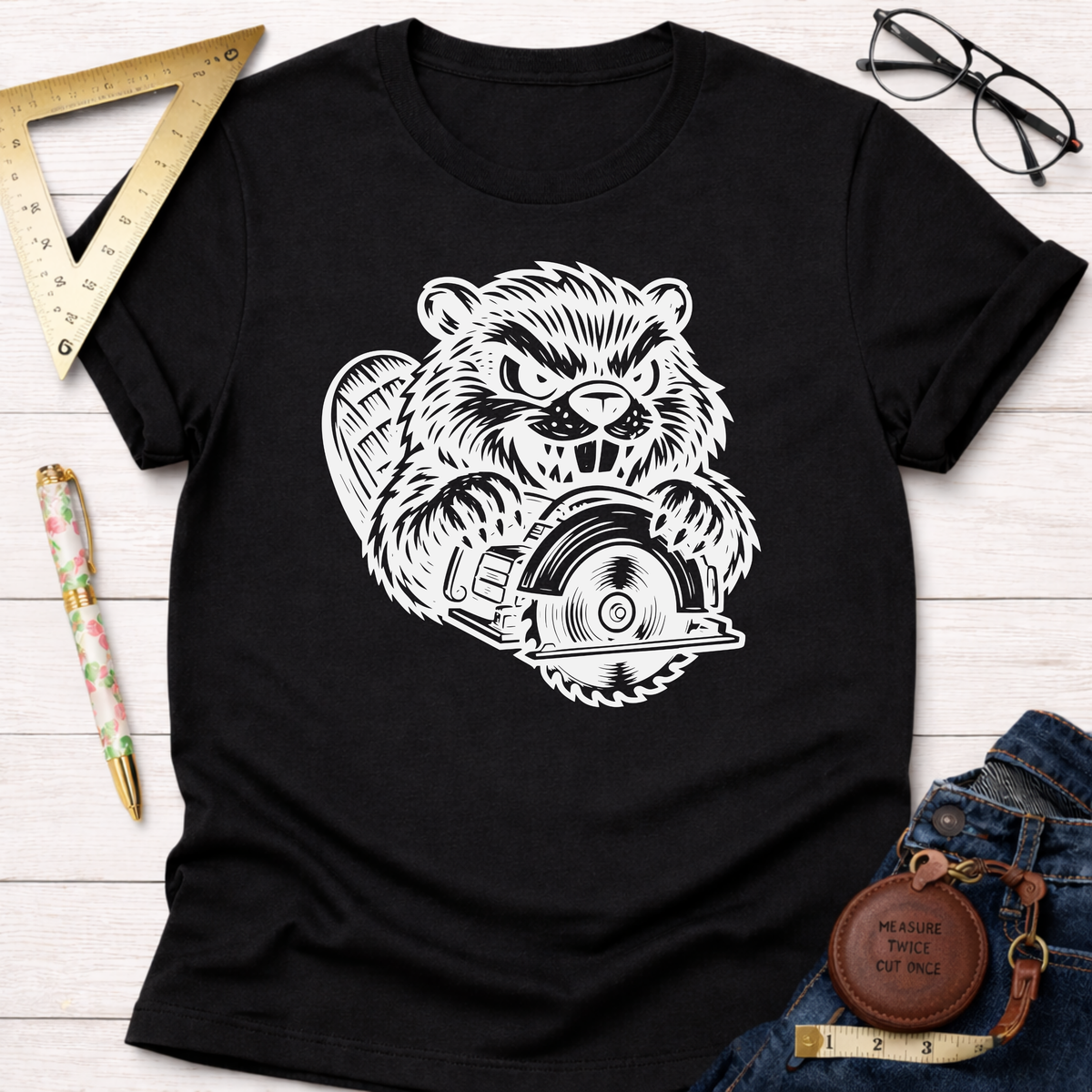 Black cotton t-shirt with a white graphic of an angry beaver holding a circular saw.