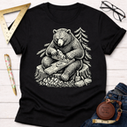 Black cotton women's funny woodworking graphic tee with a bear planing wood, for female woodworkers, makers, and DIY builders — Sawdust & Ponytails