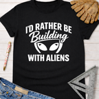 Black women's funny woodworking graphic tee with "I'd Rather Be Building With Aliens" text and alien eyes.