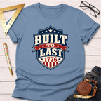 Light blue cotton t-shirt with a red, white, and blue "Built To Last 1776" badge design.