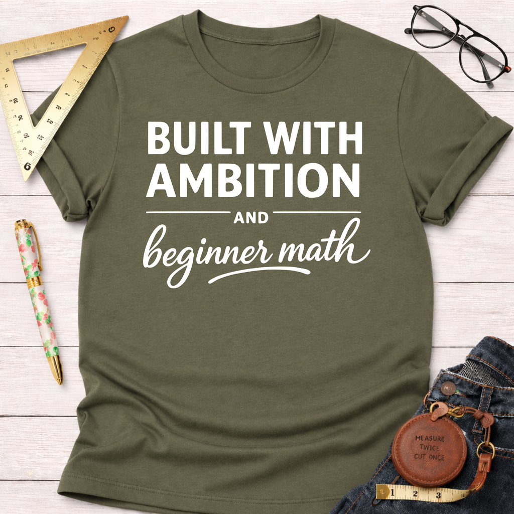 Women's funny woodworking graphic tee shirt for female woodworkers, makers, and DIY builders — Sawdust & Ponytails. Olive green cotton tee with "Built With Ambition And Beginner Math" in white.