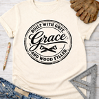 Women's funny woodworking graphic tee shirt for female woodworkers, makers, and DIY builders — Sawdust & Ponytails. Cream t-shirt with "Built With Grit, Grace, and Wood Filler" graphic.