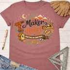 Women's funny woodworking graphic tee shirt for female woodworkers, makers, and DIY builders — Sawdust & Ponytails. Mauve cotton tee with "Maker at Heart: Crafting My Own Path" graphic.
