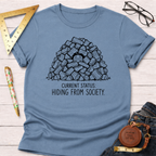 Blue cotton t-shirt with "Current Status: Hiding From Society" graphic of a person buried in logs.