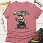 Women's funny woodworking graphic tee shirt for female woodworkers, makers, and DIY builders — Sawdust & Ponytails. Heather mauve t-shirt with a cartoon bear carpenter and "Measure Twice Cut Once Curse. Buy More Wood" text.