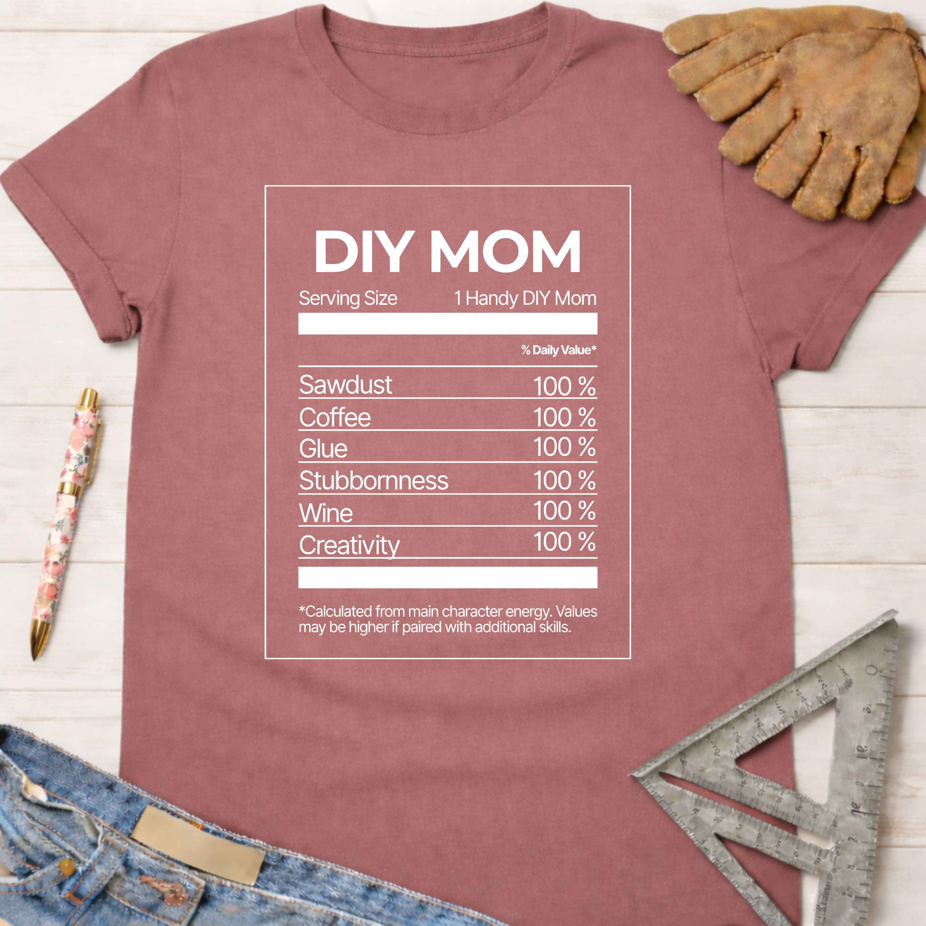Women's funny woodworking graphic tee shirt for female woodworkers, makers, and DIY builders — Sawdust & Ponytails. Mauve t-shirt with "DIY MOM Nutrition Facts" graphic.