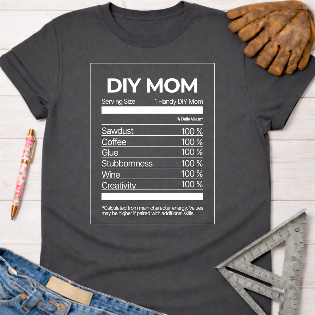 Women's funny woodworking graphic tee shirt for female woodworkers, makers, and DIY builders — Sawdust & Ponytails. Dark gray t-shirt with "DIY MOM Nutrition Facts" graphic.