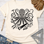 Women's funny woodworking graphic tee shirt for female woodworkers, makers, and DIY builders — Sawdust & Ponytails. Cream t-shirt with a black octopus graphic holding various tools.