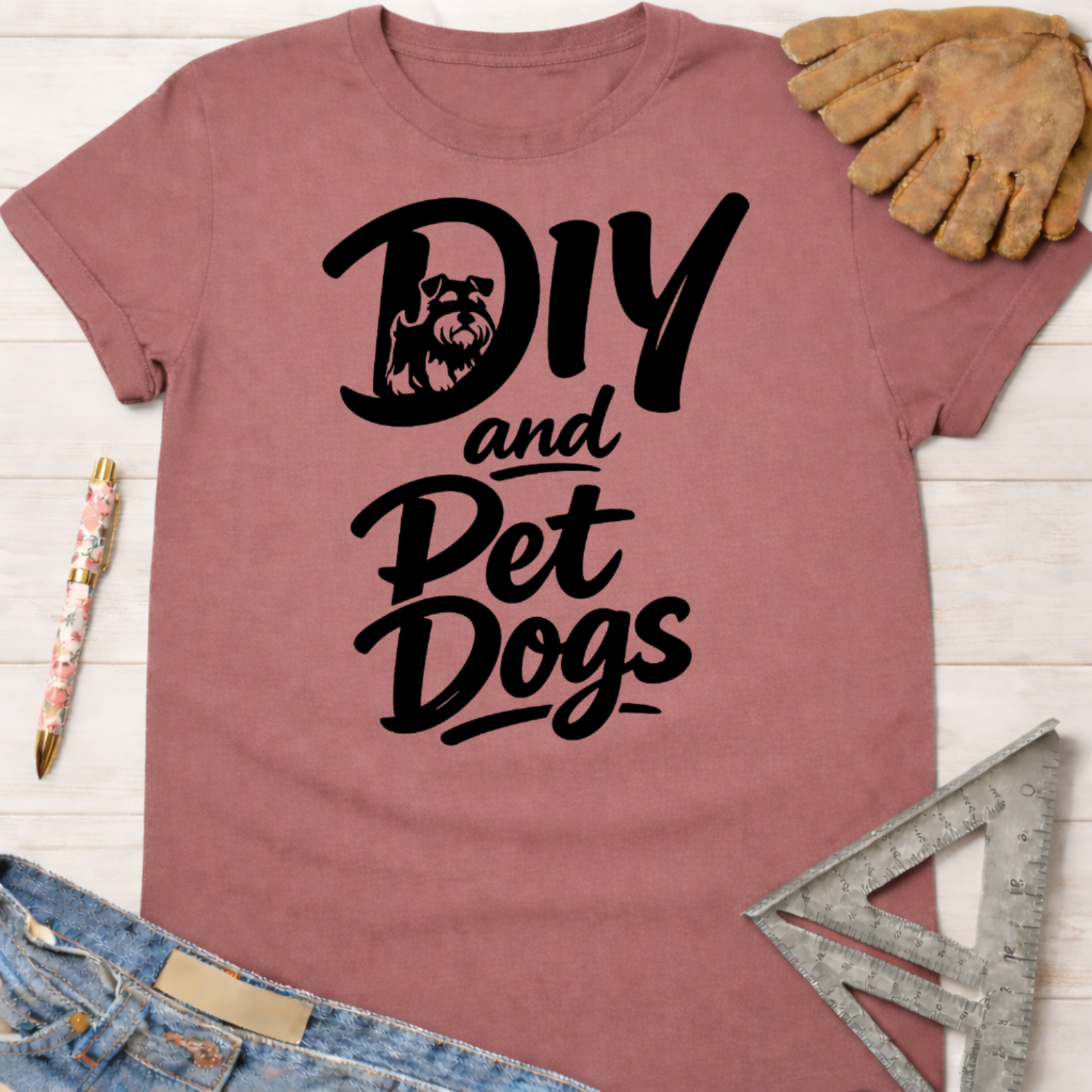 Women's funny woodworking graphic tee shirt for female woodworkers, makers, and DIY builders — Sawdust & Ponytails. Mauve cotton tee with "DIY and Pet Dogs" graphic featuring a Schnauzer.