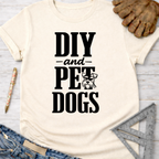 Women's funny woodworking graphic tee shirt for female woodworkers, makers, and DIY builders — Sawdust & Ponytails. Cream short-sleeve tee with "DIY and Pet Dogs" text and Schnauzer graphic.