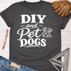 Women's funny woodworking graphic tee shirt for female woodworkers, makers, and DIY builders — Sawdust & Ponytails. Dark gray cotton tee with "DIY and Pet Dogs" text and a Schnauzer graphic.