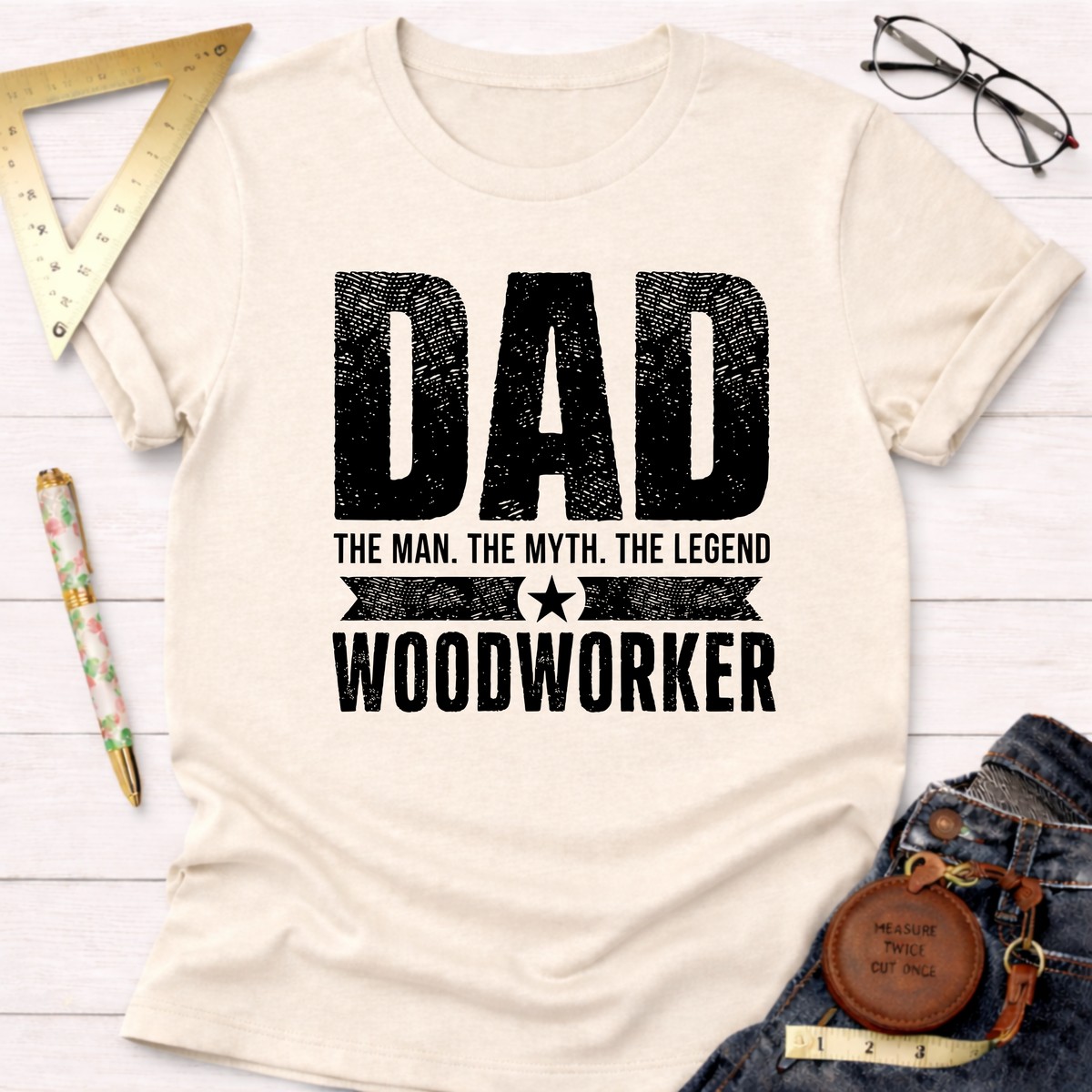 Cream t-shirt with "Dad The Man The Myth The Legend Woodworker" in black distressed text.