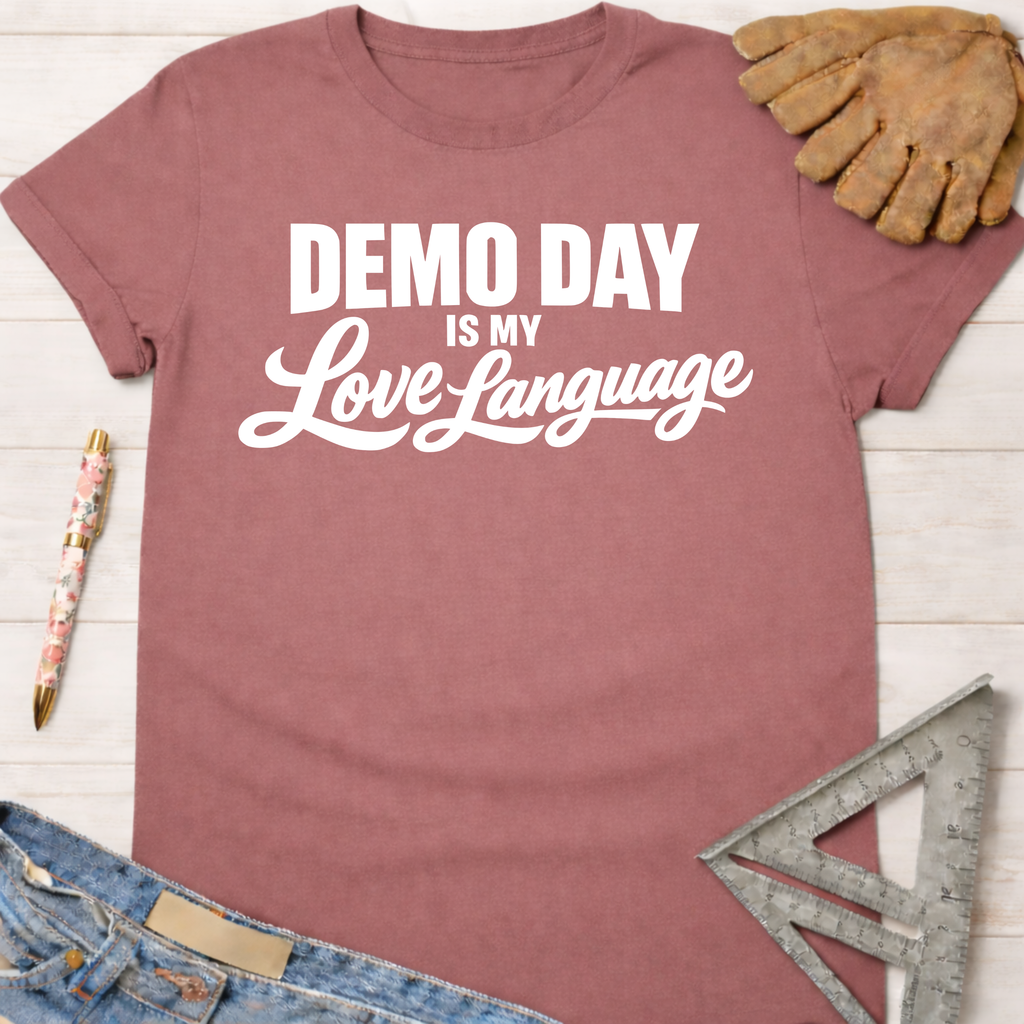 Women's funny woodworking graphic tee shirt for female woodworkers, makers, and DIY builders — Sawdust & Ponytails. Mauve cotton t-shirt with "DEMO DAY IS MY Love Language" in white text.