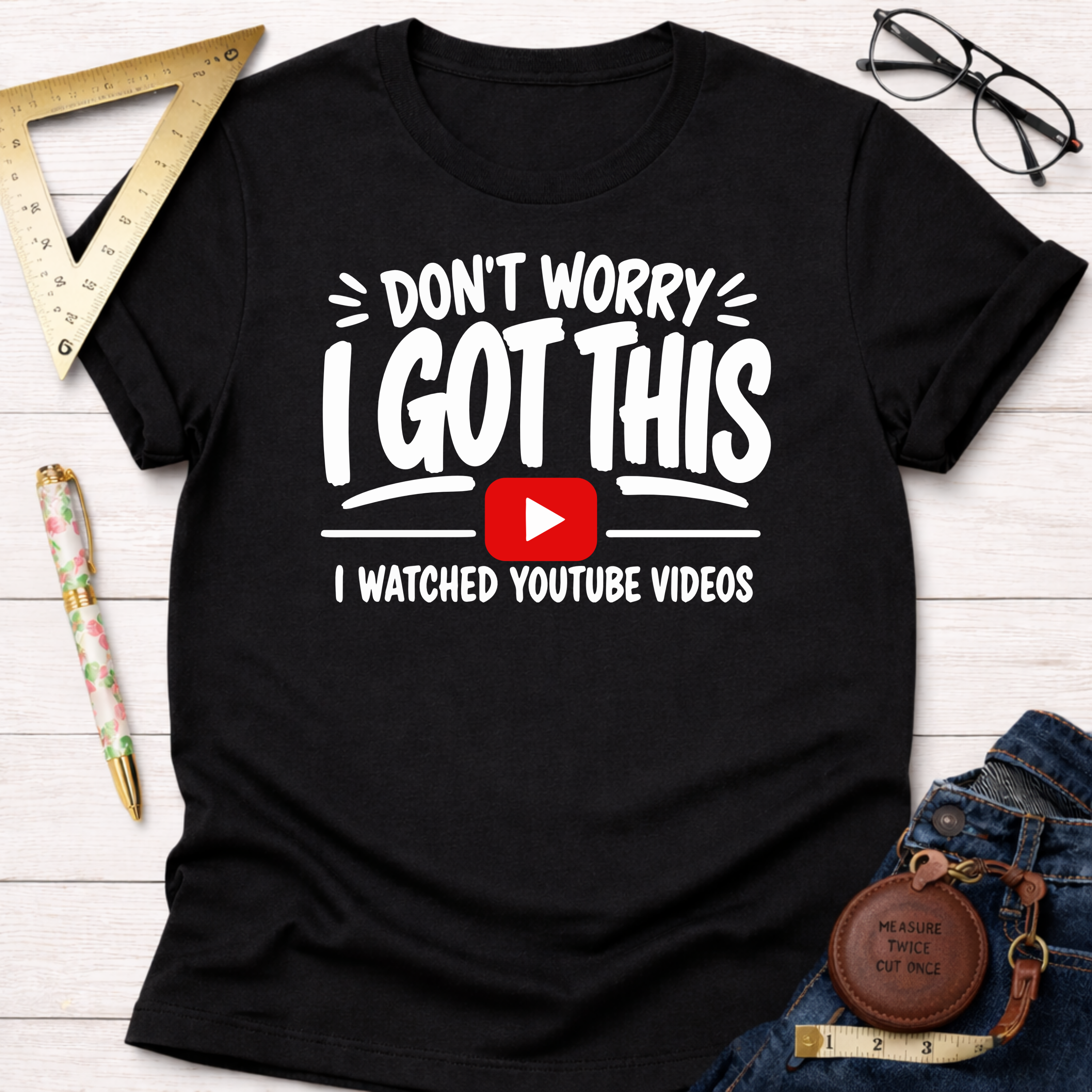 Black cotton t-shirt with "Don't Worry I Got This I Watched YouTube Videos" graphic.
