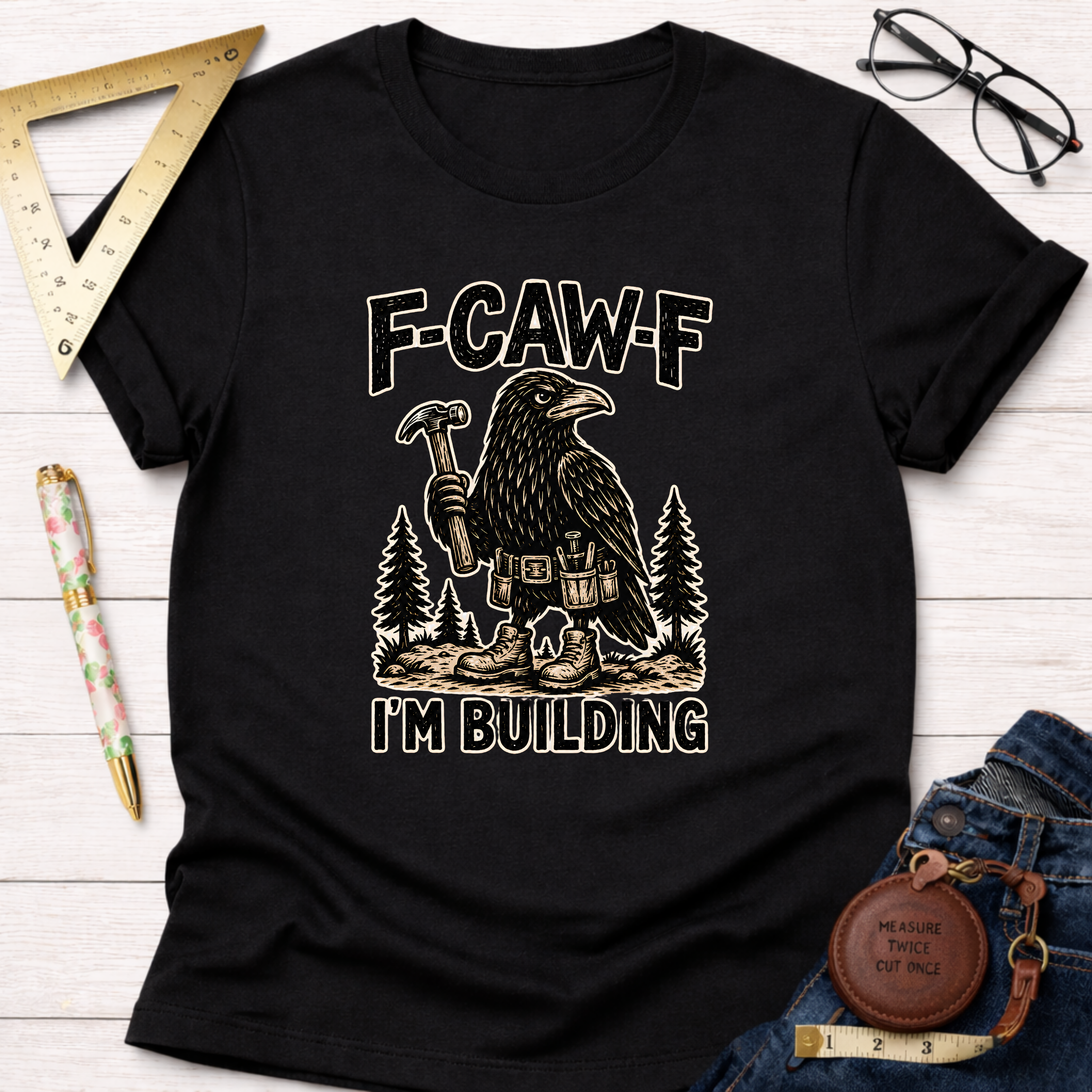 Black cotton t-shirt with a crow builder graphic, "F-CAW-F, I'm Building" text.