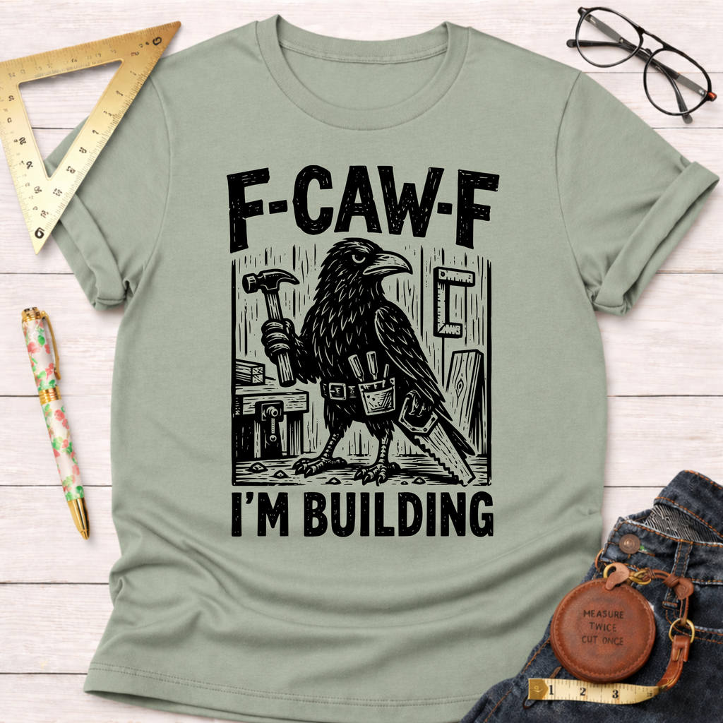 Sage green cotton "F-CAW-F I'm Building" tee with a crow carpenter graphic. Women's funny woodworking graphic tee shirt for female woodworkers, makers, and DIY builders — Sawdust & Ponytails.