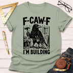 Sage green cotton "F-CAW-F I'm Building" tee with a crow carpenter graphic. Women's funny woodworking graphic tee shirt for female woodworkers, makers, and DIY builders — Sawdust & Ponytails.