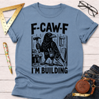 Women's funny woodworking graphic tee shirt for female woodworkers, makers, and DIY builders — Sawdust & Ponytails. Light blue cotton tee with a black crow holding a hammer and "F-CAW-F I'M BUILDING" text.