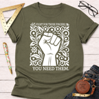Olive green cotton t-shirt with a white graphic of a raised fist surrounded by ornate floral designs and text.