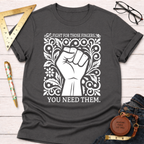 Charcoal gray cotton t-shirt with a white graphic of a raised fist surrounded by ornate floral designs and text: "FIGHT FOR THOSE FINGERS. YOU NEED THEM.