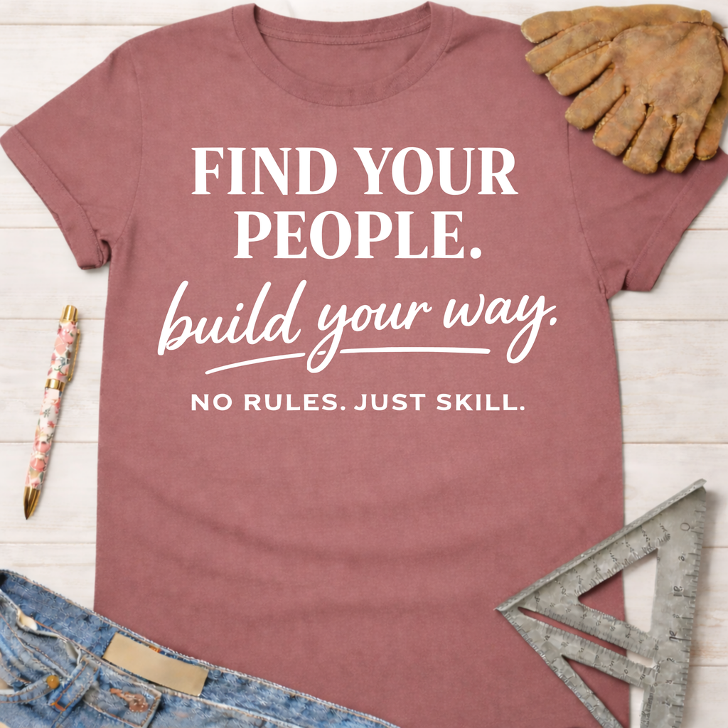 Women's funny woodworking graphic tee shirt for female woodworkers, makers, and DIY builders — Sawdust & Ponytails. Mauve cotton tee with "FIND YOUR PEOPLE. build your way. NO RULES. JUST SKILL." text.