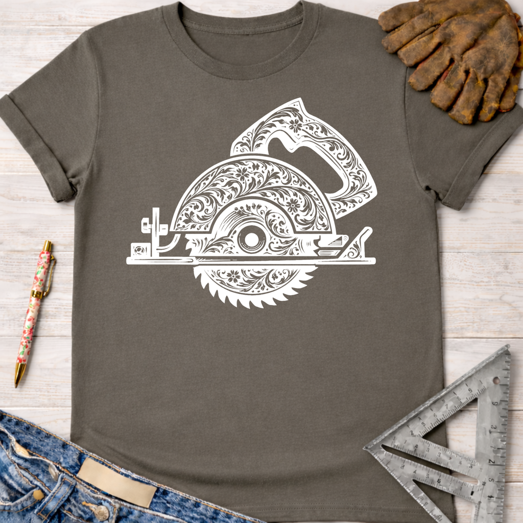 Charcoal gray t-shirt with a white floral engraved circular saw graphic. Women's funny woodworking graphic tee shirt for female woodworkers, makers, and DIY builders — Sawdust & Ponytails