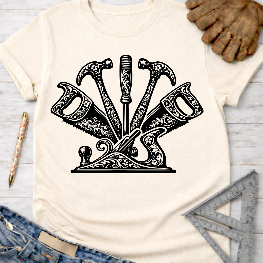 Women's funny woodworking graphic tee shirt for female woodworkers, makers, and DIY builders — Sawdust & Ponytails. Cream t-shirt with ornate black floral tool graphic.