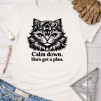 Women's funny woodworking graphic tee shirt for female woodworkers, makers, and DIY builders — Sawdust & Ponytails. White cotton tee with a black cat wearing goggles and "Calm down. She's got a plan." text.
