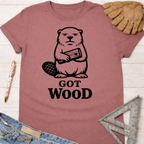 Women's funny woodworking graphic tee shirt for female woodworkers, makers, and DIY builders — Sawdust & Ponytails. Mauve t-shirt with a beaver holding wood and "GOT WOOD" text.