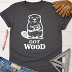 Women's funny woodworking graphic tee shirt for female woodworkers, makers, and DIY builders — Sawdust & Ponytails. Dark gray t-shirt with a white graphic of a beaver holding wood and "GOT WOOD" text.