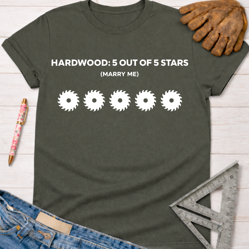 Women's funny woodworking graphic tee shirt for female woodworkers, makers, and DIY builders — Sawdust & Ponytails. Dark gray t-shirt with "HARDWOOD: 5 OUT OF 5 STARS (MARRY ME)" and five saw blade graphics.