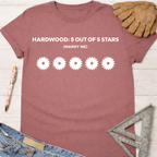 Women's funny woodworking graphic tee shirt for female woodworkers, makers, and DIY builders — Sawdust & Ponytails. Mauve cotton tee with "HARDWOOD: 5 OUT OF 5 STARS (MARRY ME)" and five saw blade graphics.