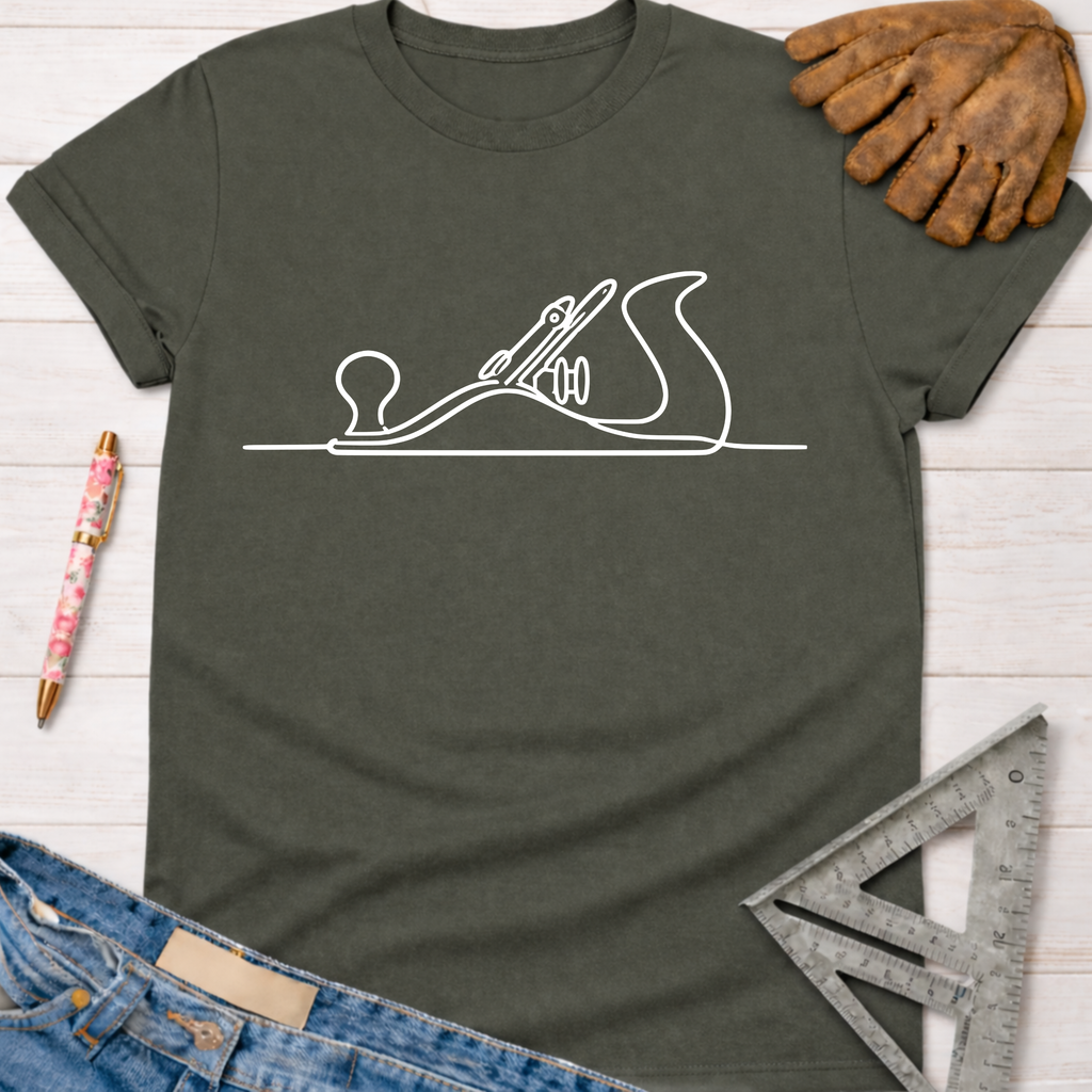 Women's funny woodworking graphic tee shirt for female woodworkers, makers, and DIY builders — Sawdust & Ponytails. Dark gray t-shirt with white hand planer line art.