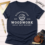 Navy blue heather t-shirt with "Handcrafted Woodwork Built Not Bought" graphic and saw blade logo.