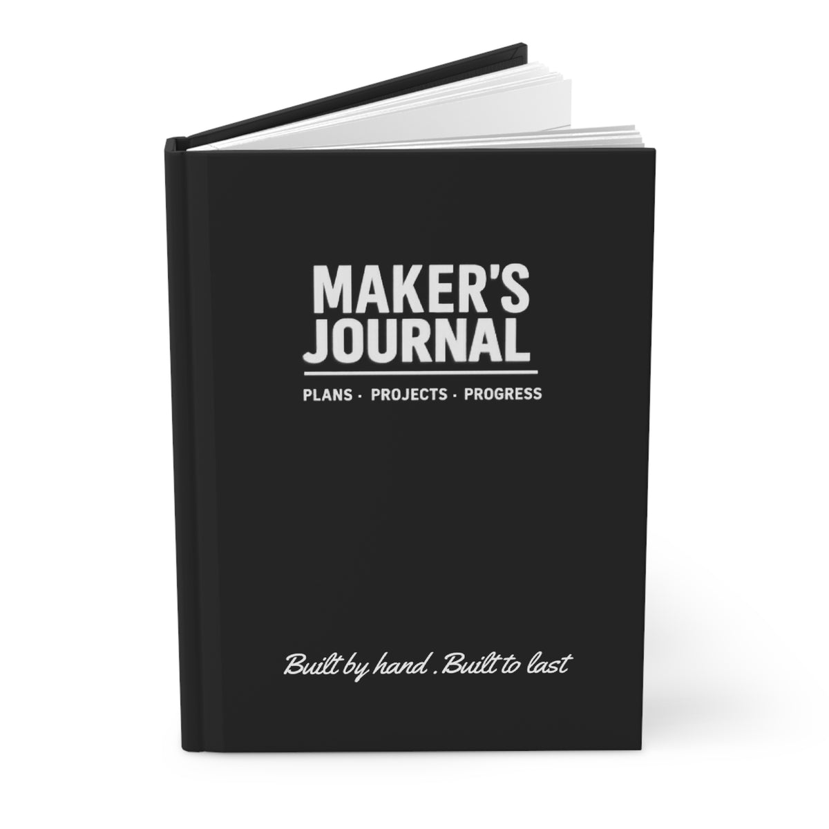 Maker's Journal held open, showing tear-out perforated page for project notes