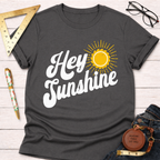Charcoal gray women's "Hey Sunshine" graphic tee with a yellow sun design, perfect for female woodworkers and DIY builders.