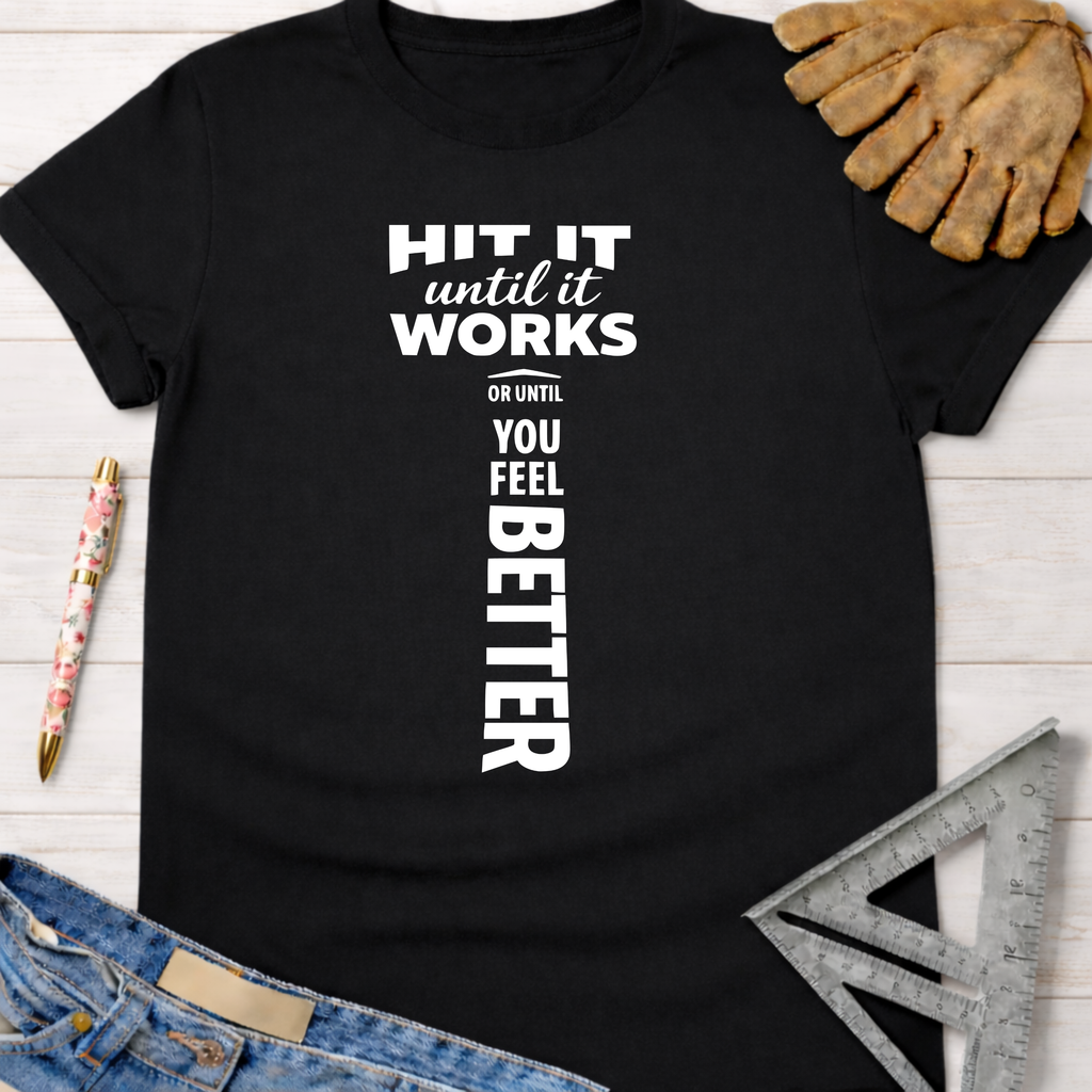 Black cotton "Hit It Until It Works" graphic tee for women, with a hammer design, perfect for woodworkers.