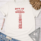 Women's funny woodworking graphic tee shirt for female woodworkers, makers, and DIY builders — Sawdust & Ponytails. Cream t-shirt with red "Hit It Until It Works Or Until You Feel Better" hammer graphic.