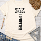 Women's funny woodworking graphic tee shirt for female woodworkers, makers, and DIY builders — Sawdust & Ponytails. Cream t-shirt with "HIT IT until it WORKS OR UNTIL YOU FEEL BETTER" text, with a hammer graphic.