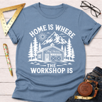 Women's funny woodworking graphic tee shirt for female woodworkers, makers, and DIY builders — Sawdust & Ponytails. Blue cotton tee with "Home Is Where The Workshop Is" graphic.