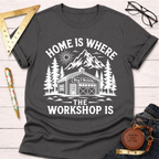 Women's funny woodworking graphic tee shirt for female woodworkers, makers, and DIY builders — Sawdust & Ponytails. Dark gray cotton tee with "Home Is Where The Workshop Is" graphic.