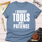 Women's funny woodworking graphic tee shirt for female woodworkers, makers, and DIY builders — Sawdust & Ponytails. Light blue cotton tee with "I BROUGHT TOOLS NOT PATIENCE" in white text.