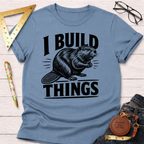 Light blue cotton t-shirt with "I BUILD THINGS" text and a beaver graphic, styled with rolled sleeves.