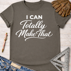 Charcoal gray women's "I Can Totally Make That" graphic tee, with work gloves and tools.